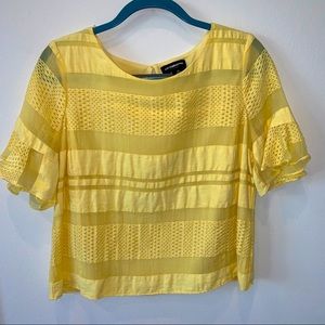 Boxy blouse with textured shell and soft lining